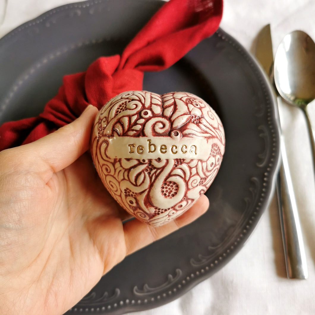 Our handmade ceramic custom place settings are a stunning alternative to flimsy paper place cards. They provide a memorable way to guide your friends and family to the right seats at your reception or shower. Additionally, the charming ceramic hearts make wonderful keepsakes to treasure after the celebration is over.