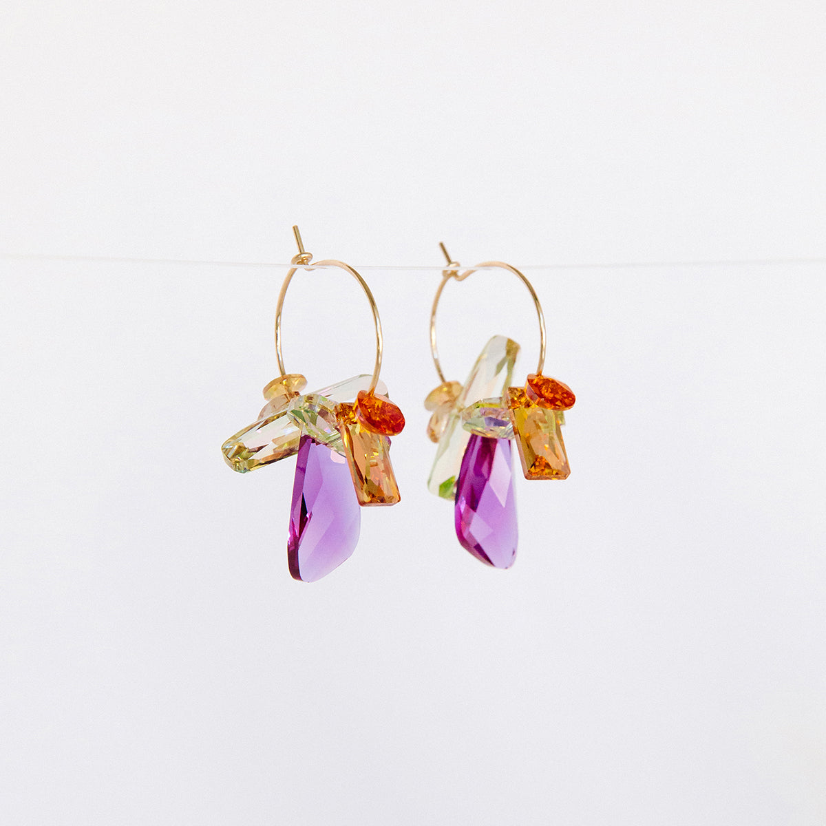 Fuchsia Earrings featuring Swarovski crystals