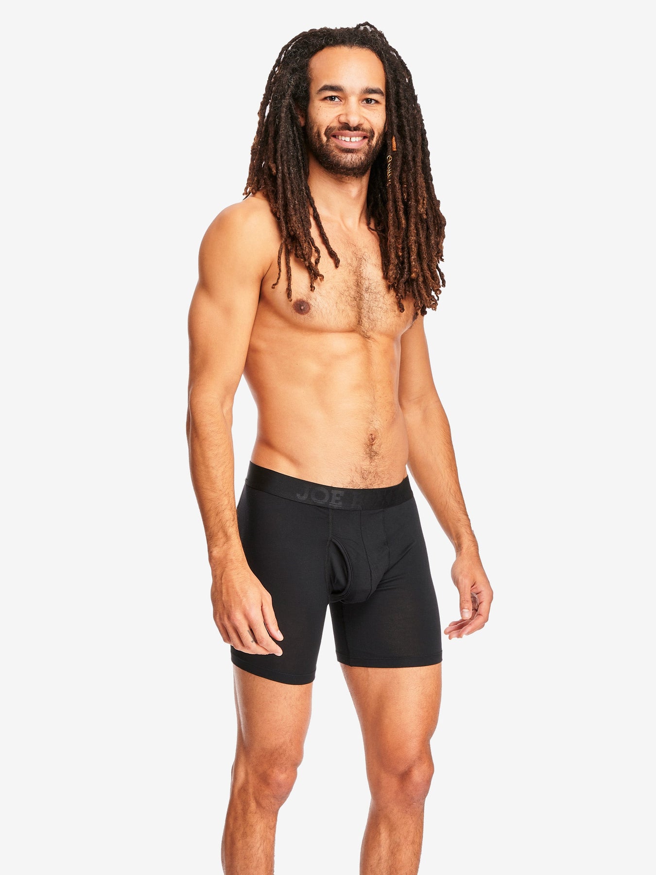A young man wearing boxer shorts, knee … – Buy image – 11440954