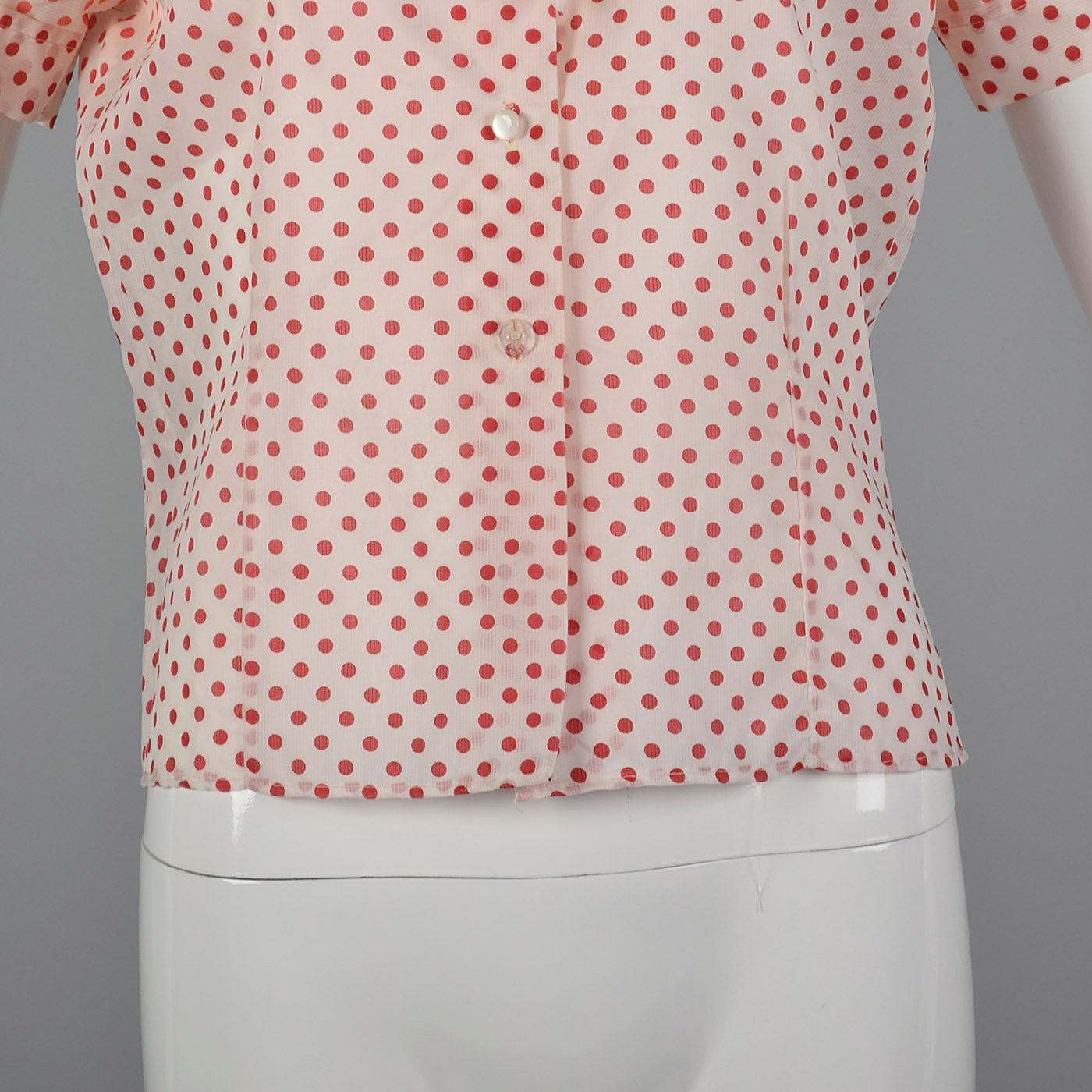 red blouse white polka dots