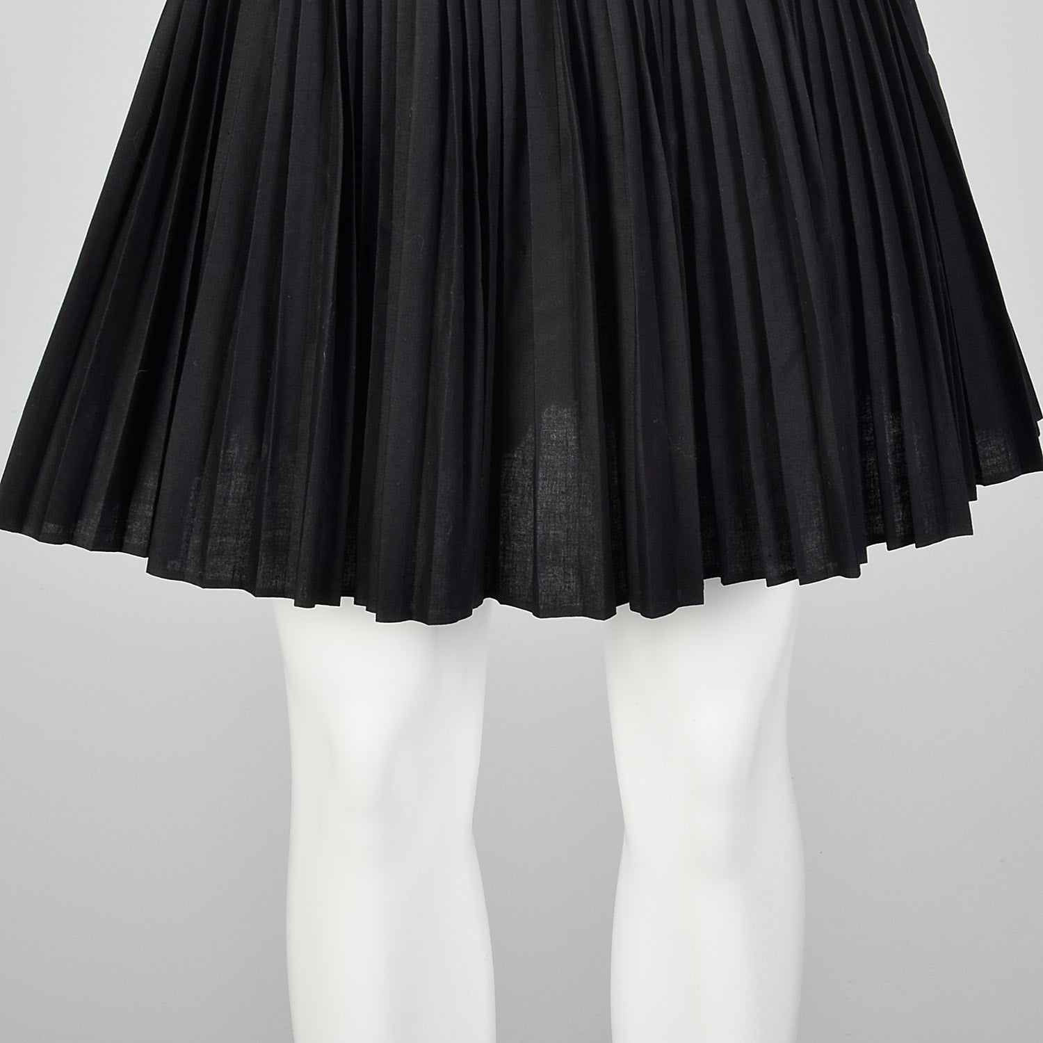 black micro pleated skirt