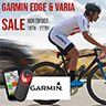 Man riding bike with Garmin logo and sale promotion surrounding him