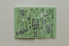 Open book with line drawings of people giving each other presents on a green background