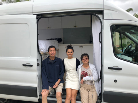 Yvonne showing Mom + Dad the van for the first time