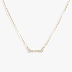 Avery Necklace. Gold necklace with small pavé bar pendant