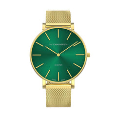 green and gold sunburst watch