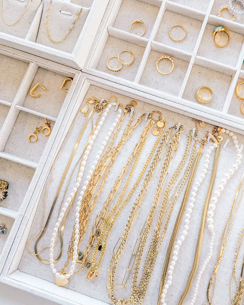 Jewelry organizers with hooks are great for necklaces and bracelets.