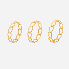 Oval ring. Gold ring made of connected oval loops in a set of three