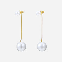 Vi Earrings. Gold long drop earrings with a medium size pearl at the bottom of the drop and small pear as the stud