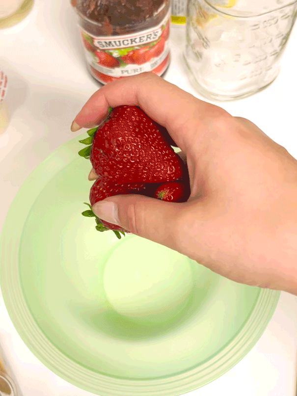 While cake is cooking, prep the strawberries