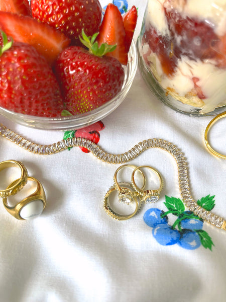 Strawberry trifle recipe and crystal choker, atmosphere ring, and moissanite sierra ring