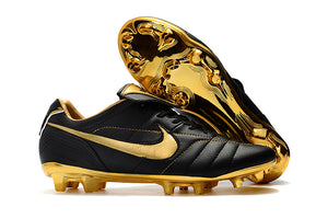 chuteira da nike preta com dourado