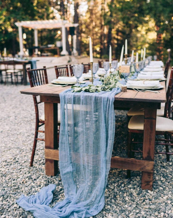 Wedding table decor for a boho wedding in the forest