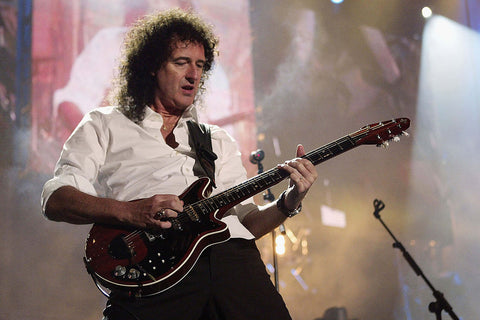 Bending the Rules: Brian May Shuns Picks for Sixpences to Strike the Perfect Chord!