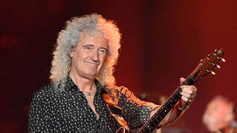 Bending the Rules: Brian May Shuns Picks for Sixpences to Strike the Perfect Chord!