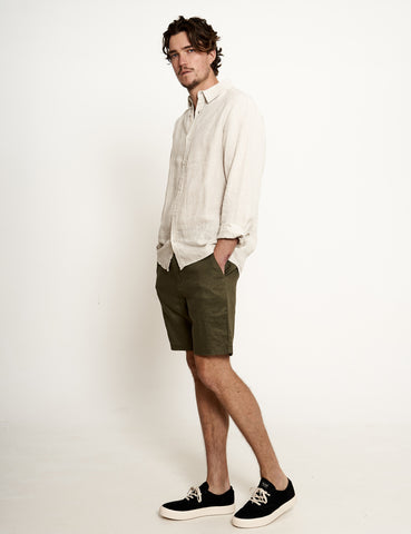male wearing linen longsleeve shirt and linen shorts