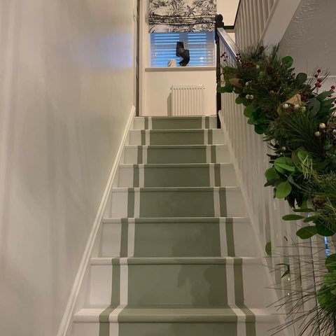 Green painted wooden stairs in Wise Old Sage shade from the Frenchic Paint series.