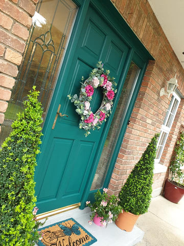 The door is painted green with Victory Lane, from the Frenchic Paint series.
