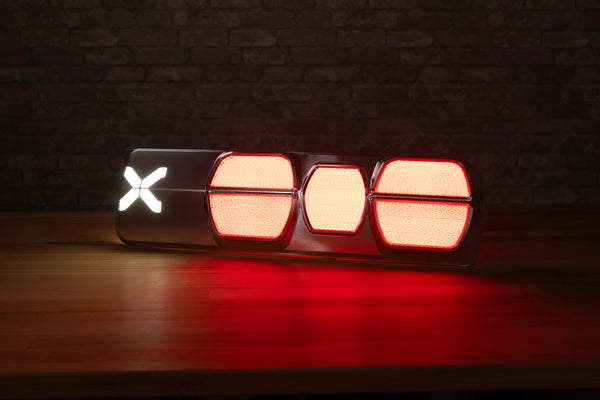 A photo of a billet tail light housing with custom LED PCBs designed by Dapper Lighting