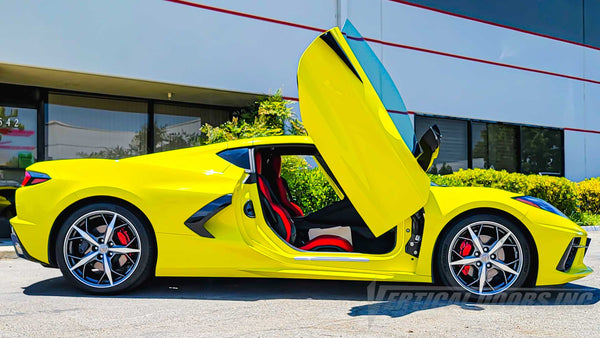 PhotoQuest Studio’s Accelerate Yellow C8 Corvette with Lambo Doors Kit installed by Vertical Doors, Inc.