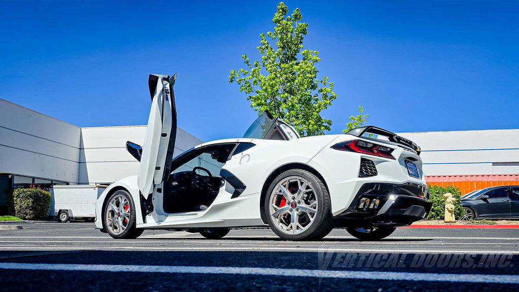 Vertical Lambo Door Conversion Kit installed on a Chevrolet Corvette C8-R, installed and manufactured by Vertical Doors, Inc.