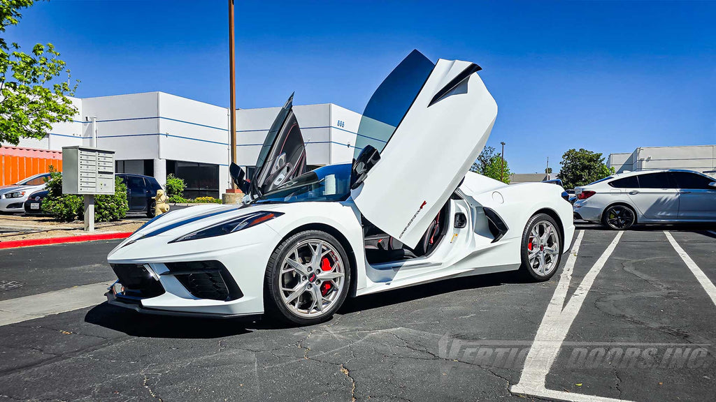 Vertical Lambo Door Conversion Kit installed on a Chevrolet Corvette C8-R, installed and manufactured by Vertical Doors, Inc.