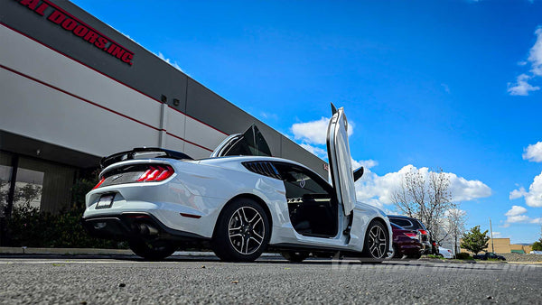 Check out @1sickstang Ford Mustang with lambo door conversion installed and manufactured by Vertical Doors, Inc.