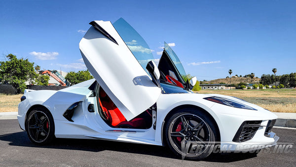 Arctic White Chevrolet Corvette C8 from California featuring Vertical Doors, Inc. door conversion kit. AKA "Lambo Doors"