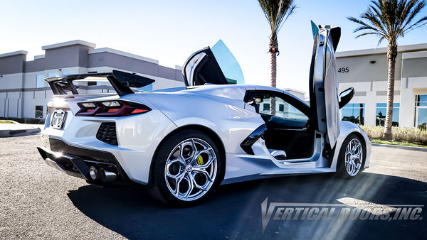 Silver Flare Chevrolet Corvette C8 from California featuring vertical lambo door conversion kit by Vertical Doors, Inc.