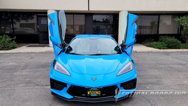 VDCCHEVYCORC820 Rapid Blue Chevrolet Corvette C8 from California featuring vertical lambo door conversion kit by Vertical Doors, Inc.