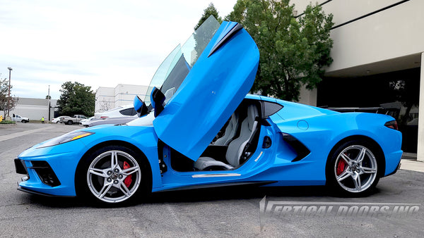 VDCCHEVYCORC820 Rapid Blue Chevrolet Corvette C8 from California featuring vertical lambo door conversion kit by Vertical Doors, Inc.