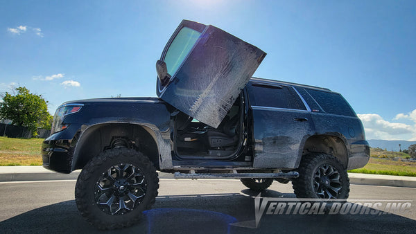 Chevrolet Tahoe from California featuring Vertical Doors, Inc. vertical lambo doors conversion kit.