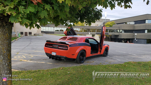 Check out Christopher's @mango3ninety2 Dodge Challenger from Ontario Canada featuring Lambo Door Conversion Kit by Vertical Doors Inc.