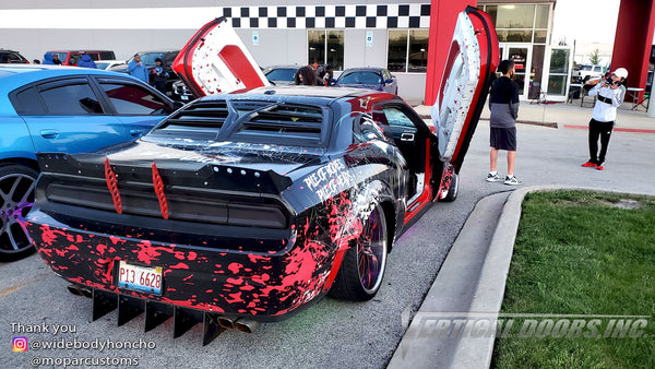 Check out Chad's @widebodyhoncho Dodge Challenger from Chicago featuring Vertical Doors, Inc., Vertical Lambo Doors Conversion Kits.