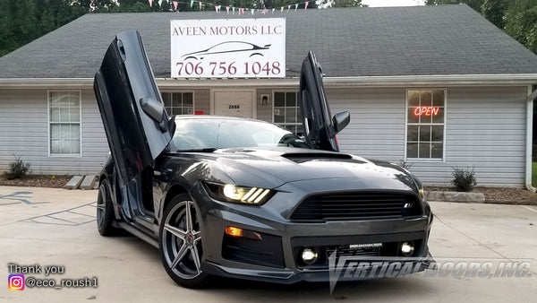Check out Ron's Ford Mustang, Roush RS1 Edition from Tennessee featuring Vertical Lambo Doors Conversion Kit from Vertical Doors, Inc.  Thank you for the images Ron  IG: eco_roush1 Youtube: https://youtu.be/O2NKnM05qmI Facebook: GreatRondini   <hr> I have been working on my car for the past 2 years and have been lightly modifying it. It is aesthetically pleasing on the eyes and I get tons of compliments daily. Since I have been working on my car for the last 2 years, I have attended several car meets, Cars and Coffee monthly meets, Motors and Mouths monthly meets, numerous car shows (out of which I allowed my car to be judged 2 times and I got 2 trophies), The Mustangs At The Mountain Annual Event (next event is in May), The Jordan High School Annual Car Show the past 2 years (next event is next month), I plan on attending the NMRA/NMCA ALL-STAR Nationals Car Show on April 6th. I am part of several Mustang groups and 2 local car clubs.  My car has an amazing background story beginning with the fact that I was struggling to find a nice sports car that fit me. After searching for 3 straight months, I finally found it! My 2015 Roush RS1 was used but it was the newest and nicest car I have ever owned. I immediately wanted to add to the looks and bought louvers for the back window and side windows.  One week before Christmas 2018, my car was vandalized in Memphis, TN while i was gone for work. The criminals broke my pasenger side window and took my wheel lug key and stole my performance package wheels, tires, and also damaged my louvers and brake calipers. Since then I have brought my car back to life and "Phoenix" rose from the ashes!  From there it has skyrocketed with my determination to make my car the best that I can!   My current mods are as follows:  *ETS Front Mount Racing Intercooler  *COBB OTS Stage 2/93 Octane *Tune *Custom Roush Decals  *LED Under Glow Lights *Mishimoto Single Catch Can *MMD Resonator Delete  *19" Advanti Caminno Matte Gunmetal Wheels Staggered *19x8.5 Front Wheels *19x9.5 Rear Wheels  *25 MM Wheel Spacers On Front And Rear *Custom Motor Cover Graphics *Custom Made Roush Wheel Cap Emblems *Phoenix Automotive 10.4" Vertical Tesla Style Touchscreen Radio *1 TB External Harddrive  *Custom Painted ROUSH Decklid Lettering *ZL1 Roush S poiler Wickerbill Add-on  Upcoming Mods include:  *Custom Built 4th Order Bandpass Subwoofer Enclosure With Custom LED Lighting (Currently Building) *Audiopipe APCLE -15001D Amplifier (Purchased) *Audiopipe XV-BXP-SUB Digital Bass Processor  (Purchased) *American Bass ELITE-1244 Single 12" Subwoofer (Purchased) *Custom Built Rear Seat Delete (Currently Building) *PLM Stainless And Catless Downpipe (Purchased) *Turbosmart Wastegate Actuator (Purchased) *Protune By Purple Drank Tuning *NGK One Step Colder Plugs *Air Ride Suspension   I am working on taking my social media to the next level as i am building more of a fan base. My Instagram is @eco_roush1 and same with YouTube. I want to get more into creating and posting videos.   Ron Kent   . . Ford Mustang 2015-2019 Lambo Door Conversion Kit by Vertical Doors Inc. Part Number: VDCFM15  This kit will fit FORD MUSTANG ALL 2015, 2016, 2017, 2018, 2019 Vertical Doors, Inc. is the only manufacturer of Vertical Lambo Doors and ZLR Door Conversion in the USA. All Vertical Doors, Inc. kits are proudly made 100% in the USA. This kit will fit all models of the 6th Generation Ford Mustang. Easy Intallation No Welding Free Tech support  #ford #mustang #6thgen #stang #VerticalDoorsInc #LamboDoors #VerticalDoors #DoorConversion #MadeintheUSA #USA #doors #love #happy #picoftheday #repost #style #swag #work . . Hi, can you send us your best high resolution images to social@verticaldoors.com and also if you have a car meet, car show or any event where your vehicle will be featured let us know and we can promote it on our Social Media and “Event” page at no cost. (If event, please send pic/banner and text with event info). Please include Car Info, Car Club Info, Shop Info, Marketing Company, photographer info and social medial names for built credit in the post. Thank you.