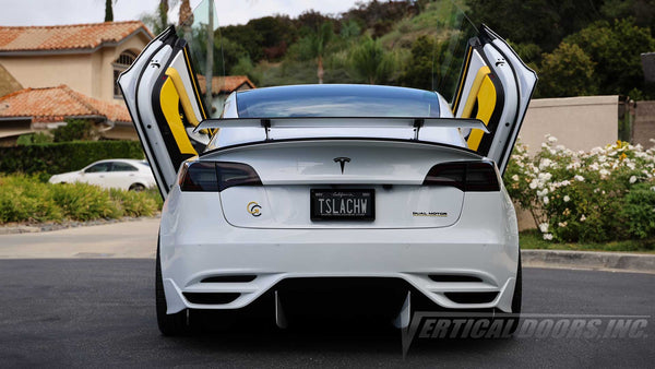 @teslachew showing off his Tesla Model 3 with a Lambo Door kit by Vertical Doors, Inc.