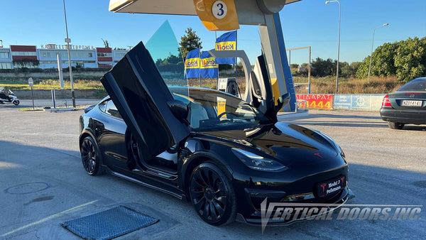 Tesla Model 3 from Thessaloniki, Greece  featuring Vertical Door conversion kit by Vertical Doors, Inc. AKA "Lambo Doors"