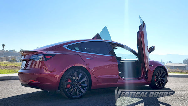 Tesla Model 3 from California featuring Vertical Doors, Inc., vertical lambo doors conversion kit.