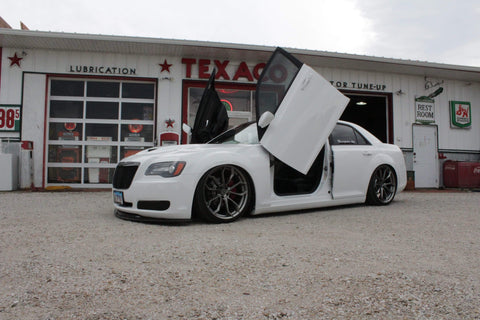 Check out Jamie's Chrysler 300 featuring Front and Rear Vertical Lambo Doors from Vertical Doors, Inc. 