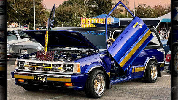 New Spirit Car Club 1990 Mazda B2600i showing off Door conversion kit by Vertical Doors, Inc. AKA "Lambo Doors"