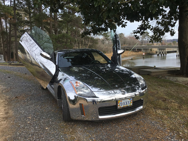Check out Dicky's 2004 Nissan 350Z from Smithfield Virginia featuring Avery Chrome Wrap and Verical Doors, Inc. vertical doors conversion kit.