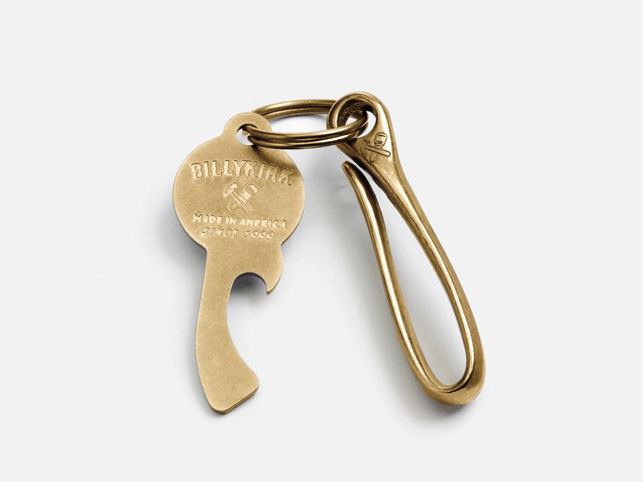 https://cdn.shopify.com/s/files/1/0179/8075/products/no-506-brass-fish-hook-and-bottle-opener-grey-bg.jpg