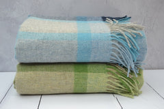 Wool throws, hand woven in limited numbers