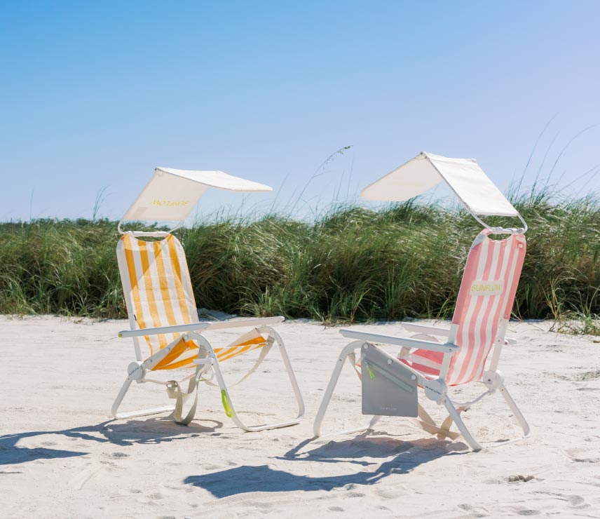 Striped SUNFLOW Shore Thing Chairs with sun shade on the beach