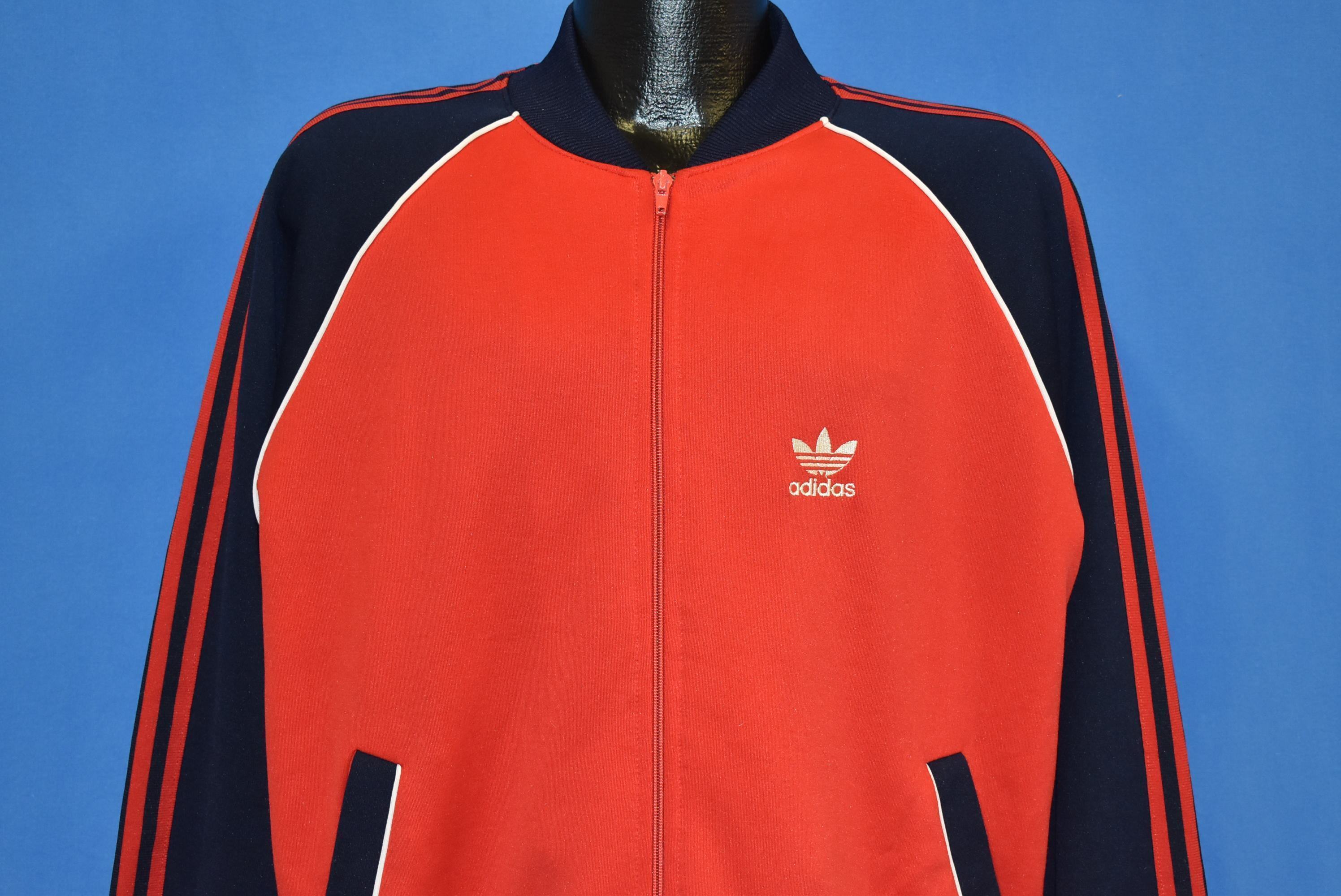 red blue and white adidas jacket