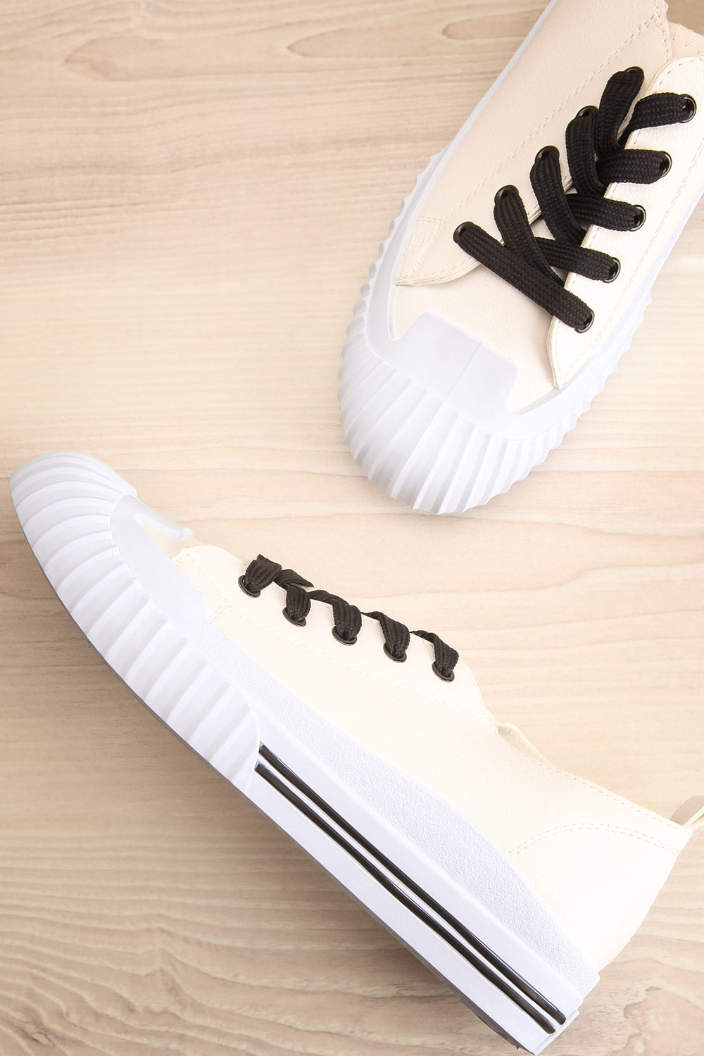 white canvas lace up sneakers