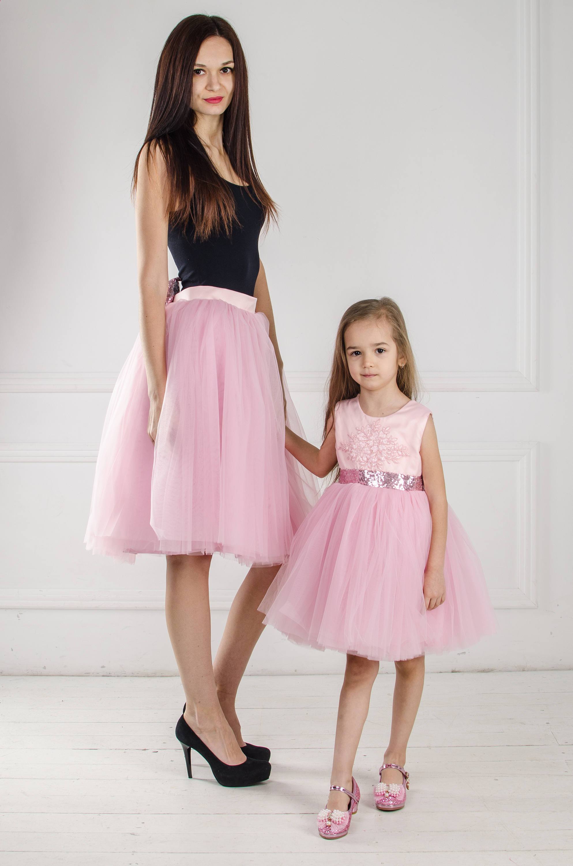 Matching pink outfits Mother daughter 