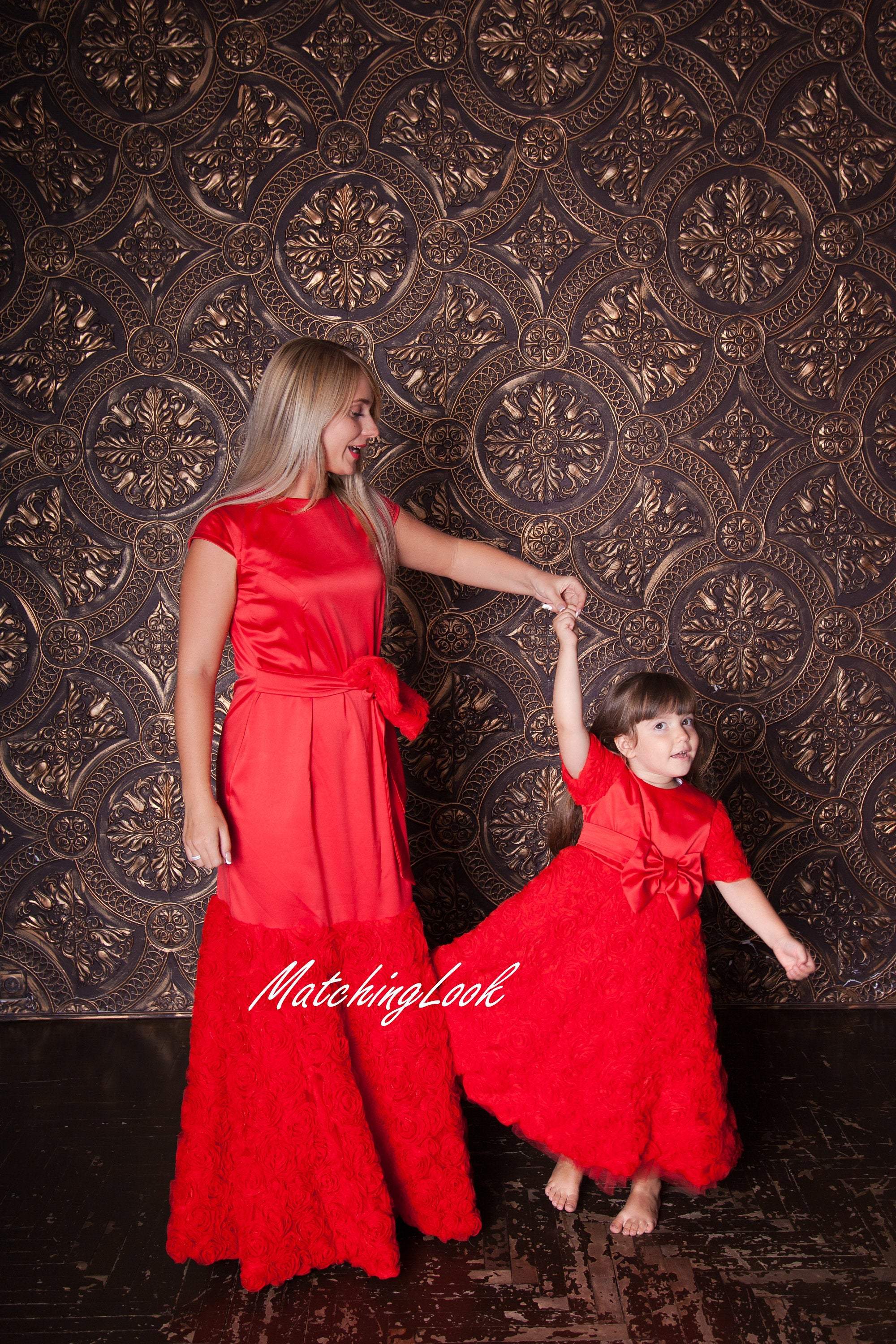 matching red dresses for mother and daughter