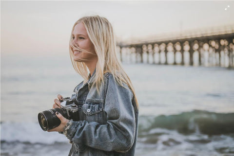 a woman with a camera