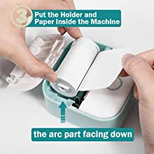 The third step to use Phomemo T02 sticker printer is put the holder and paper inside the machine, the acr part facing down.